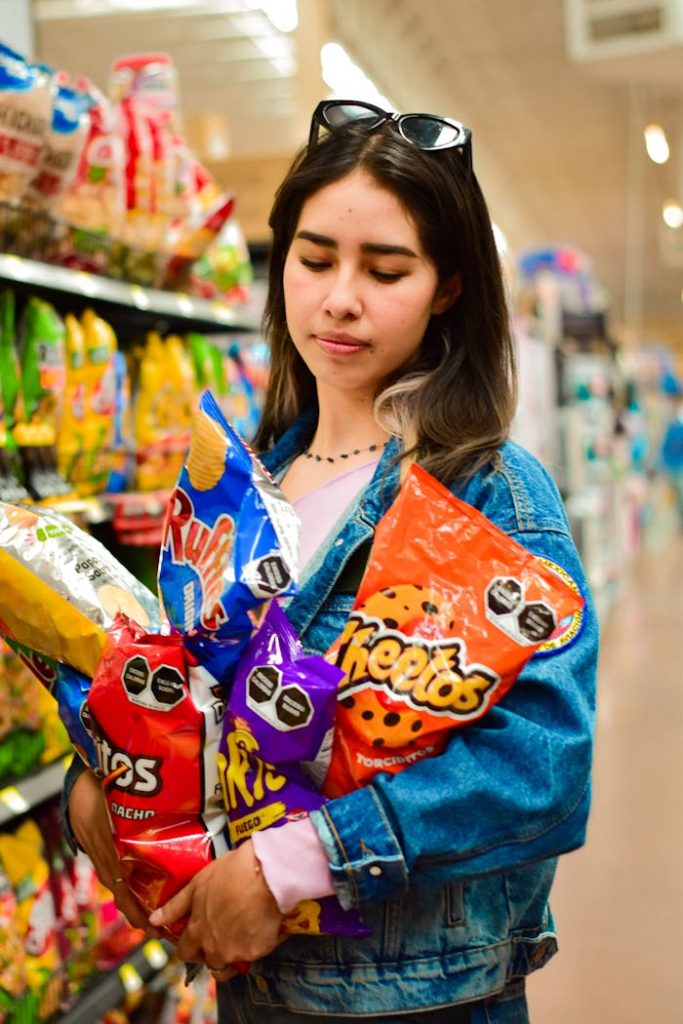 Woman is Buying Snacks