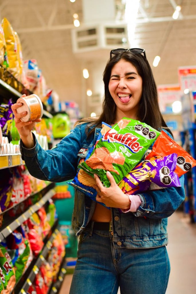 Smiling Woman is Buying Snacks
